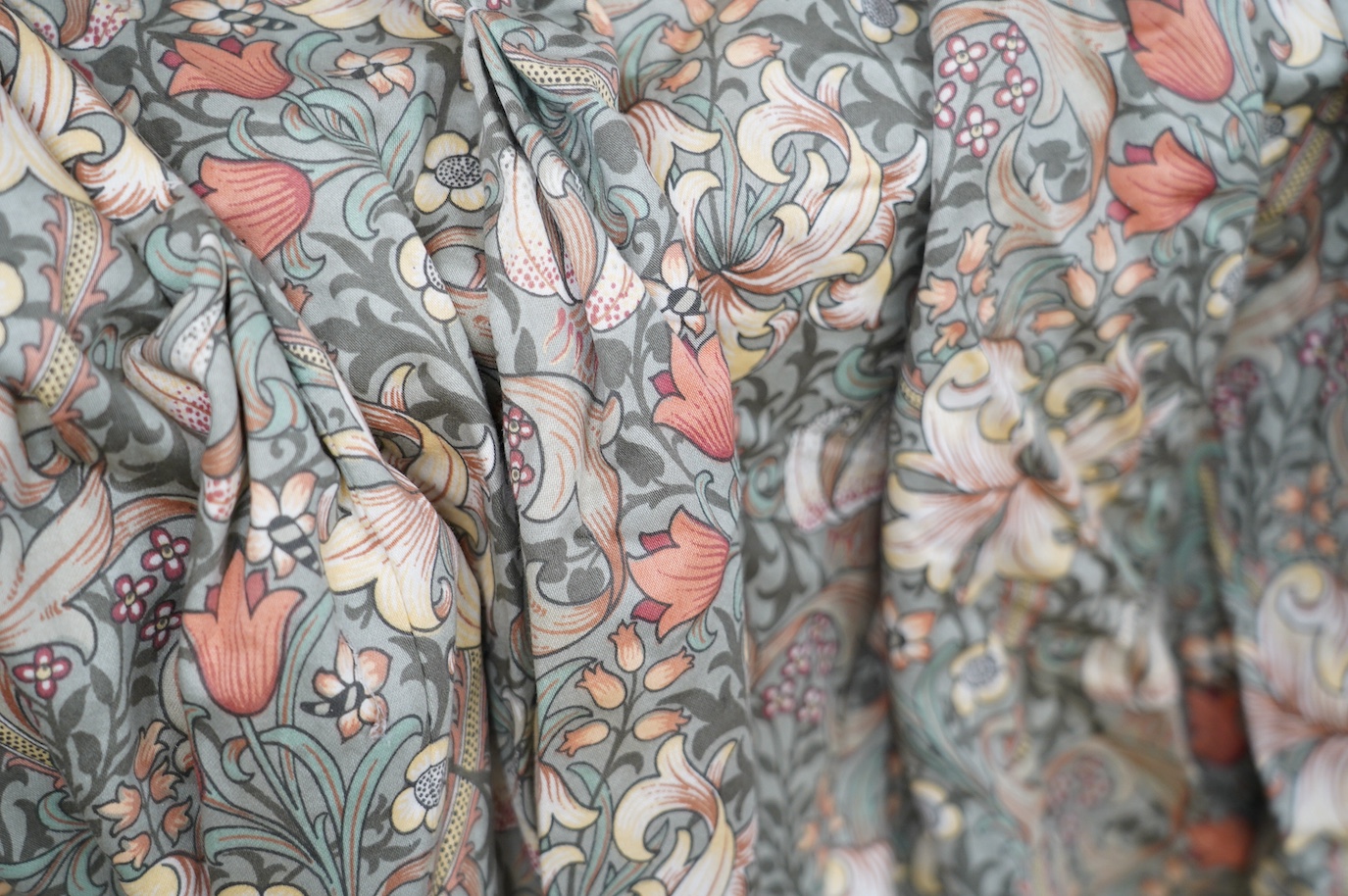 A pair of modern Sandersons William Morris designed curtains. 218cm wide (at the top), 240cm long. Condition - fair